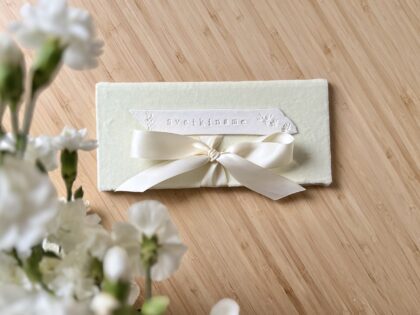 Vokelis Pinigams "Sveikiname"